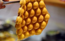 港式雞蛋仔成創業風口？傳統小吃怎么煥發新生？揭秘爆火秘訣！