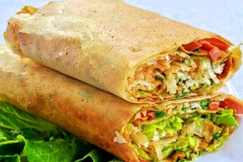 掌握煎餅果子技術，學會制作最正宗的街頭美味。