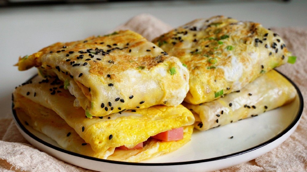 在哪里學做早餐，煎餅果子？來這里學正宗做法！